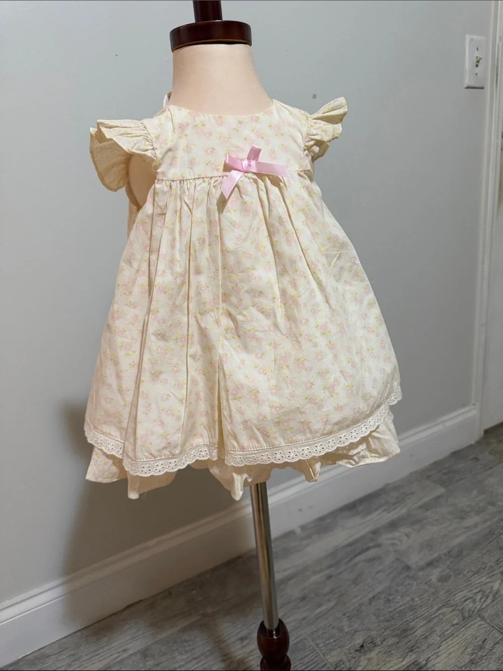 Delicate Pink Floral Ruffled Baby Dress with Satin Bow